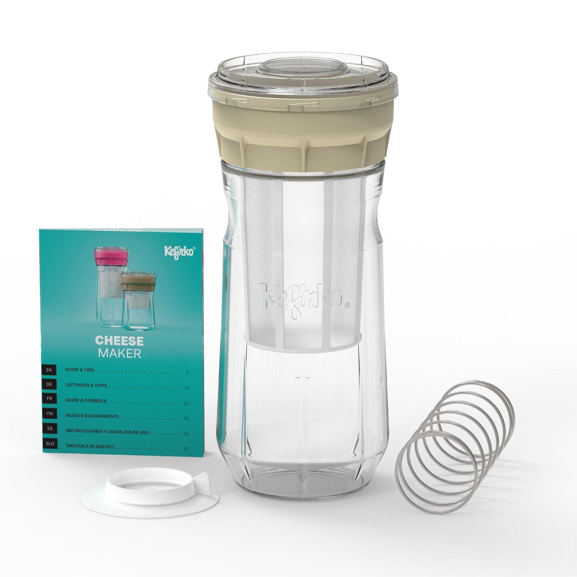 Fermentador de queso Kefirko en color beige, con jarra de vidrio, filtro, resorte de presión y libro de instrucciones.