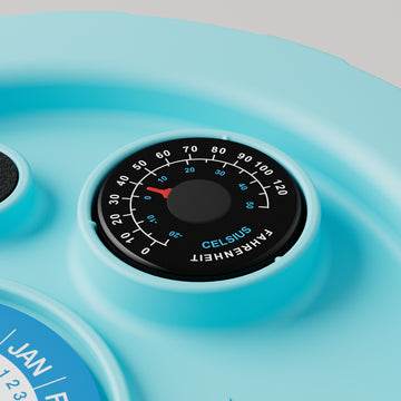 Primer plano del termómetro en la tapa del fermentador, que mide la temperatura en Celsius y Fahrenheit.